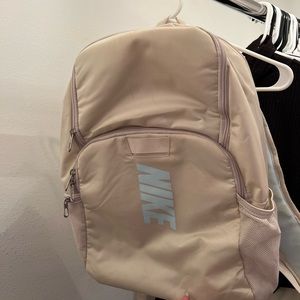 cream nike backpack